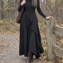 Hazel Draped Roll Neck Maxi Dress in Black on an autumn walk