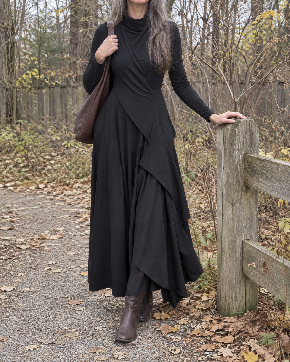 Hazel Draped Roll Neck Maxi Dress in Black on an autumn walk