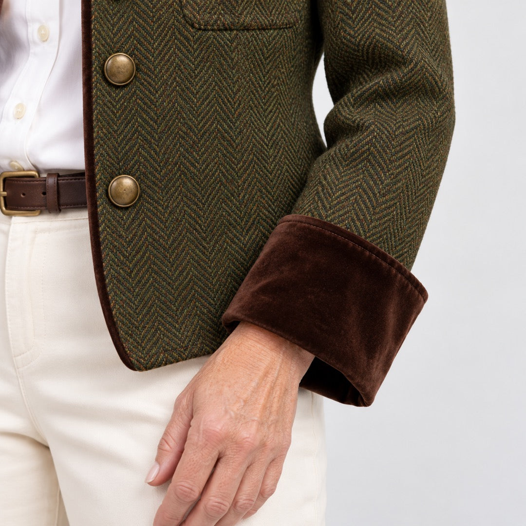 Detail of the Bernadette Herringbone Tailored Jacket with Velvet Trim in Olive