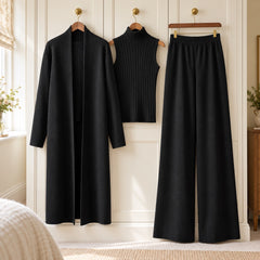 The Celia Three-Piece Knit Set with Long Cardigan in Black on a hanger
