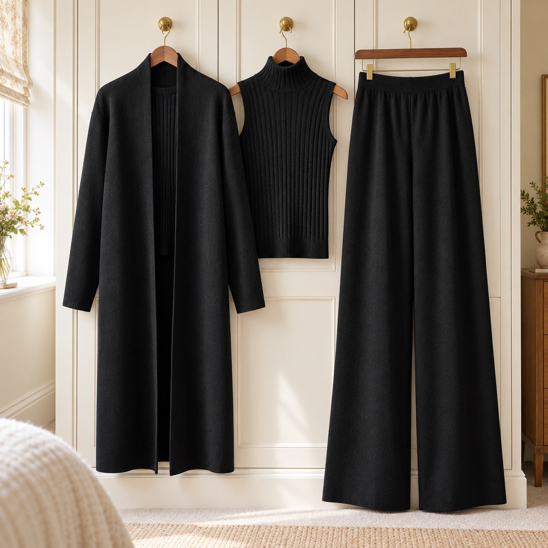 The Celia Three-Piece Knit Set with Long Cardigan in Black on a hanger