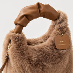 Close-up of the Debbie Faux Fur Shoulder Bag with Top Handle in Brown