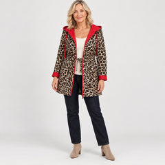 The Donna Reversible Leopard Print Hooded Coat in the studio