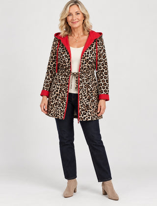 The Donna Reversible Leopard Print Hooded Coat in the studio