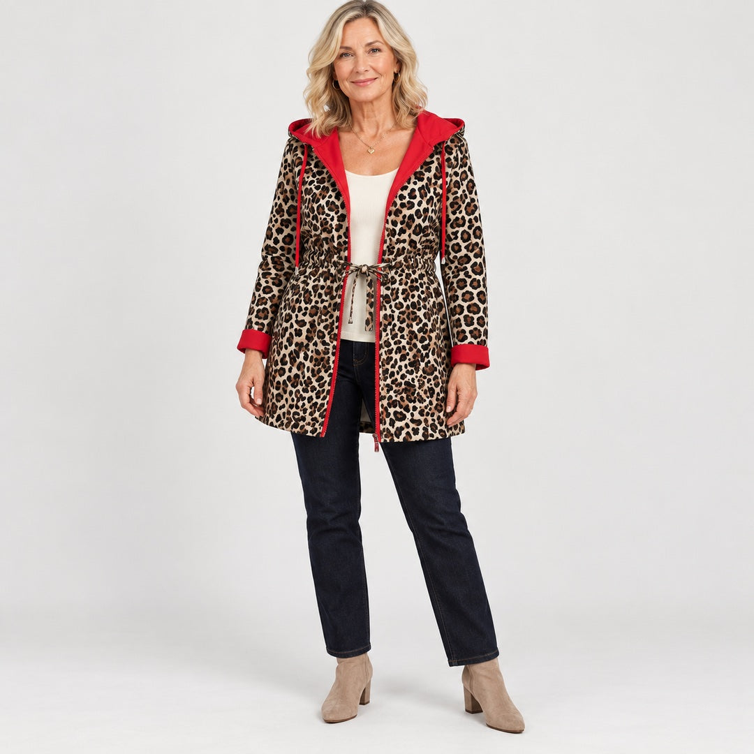The Donna Reversible Leopard Print Hooded Coat in the studio