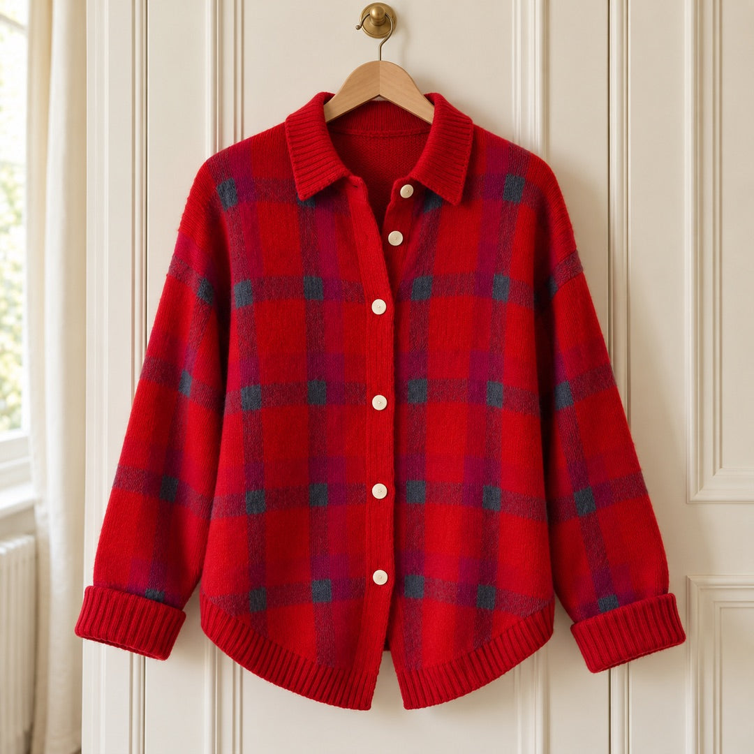The Elspeth Heritage Check Collared Knit Cardigan in Red on a hanger