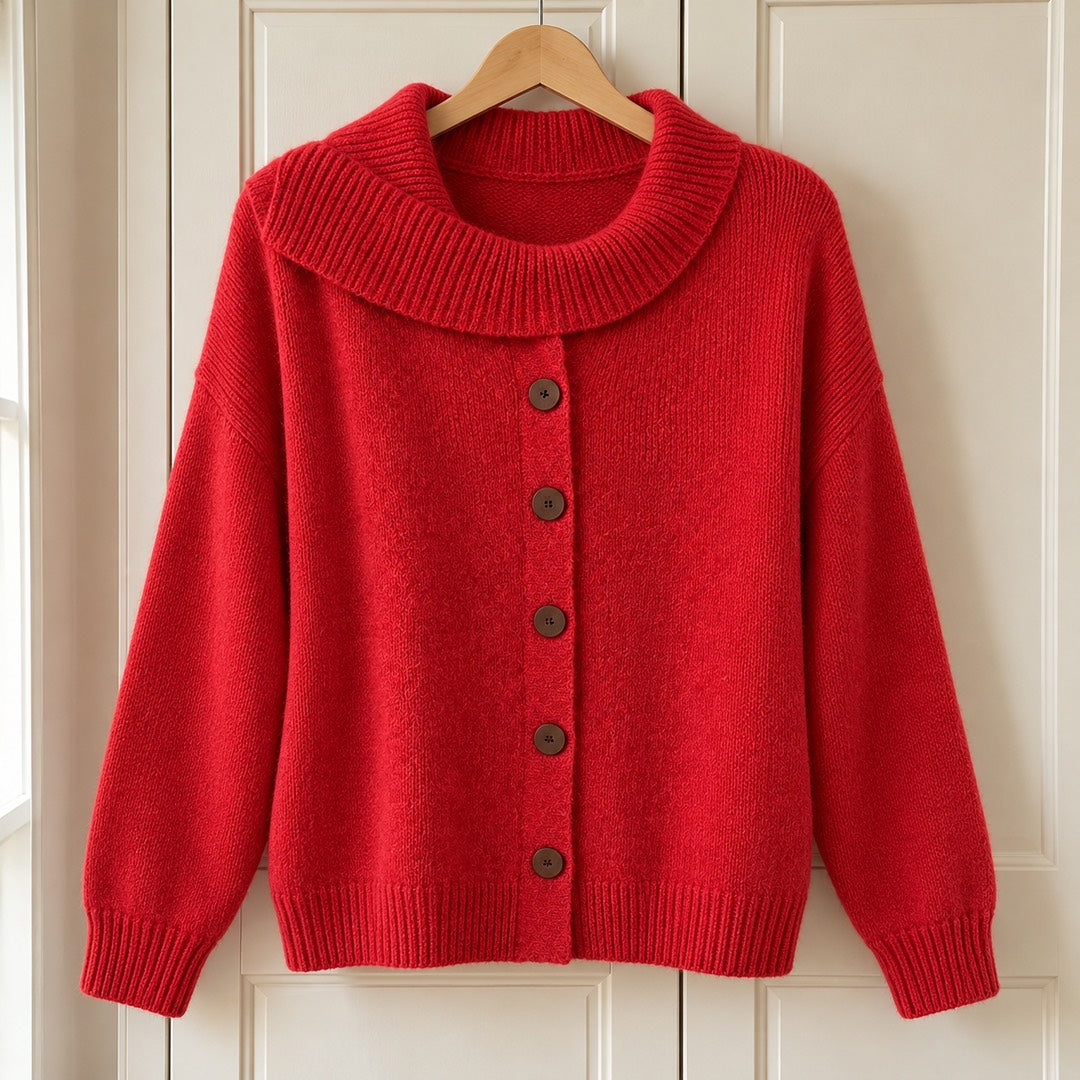 The Glynis Wide Collar Button Front Knit Jumper on a hanger
