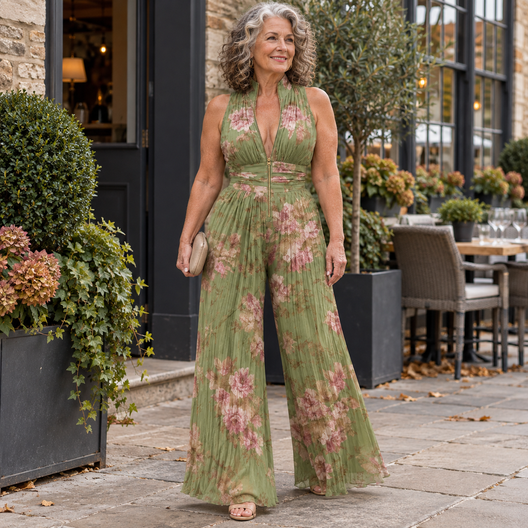Jacqueline Pleated Floral Wide-Leg Jumpsuit in Green - worn outside a restaurant