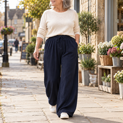 Jan Relaxed Wide-Leg Drawstring Trousers in Navy, worn out and about