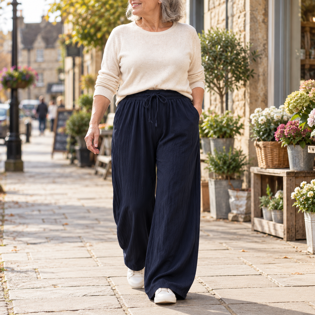Jan Relaxed Wide-Leg Drawstring Trousers in Navy, worn out and about