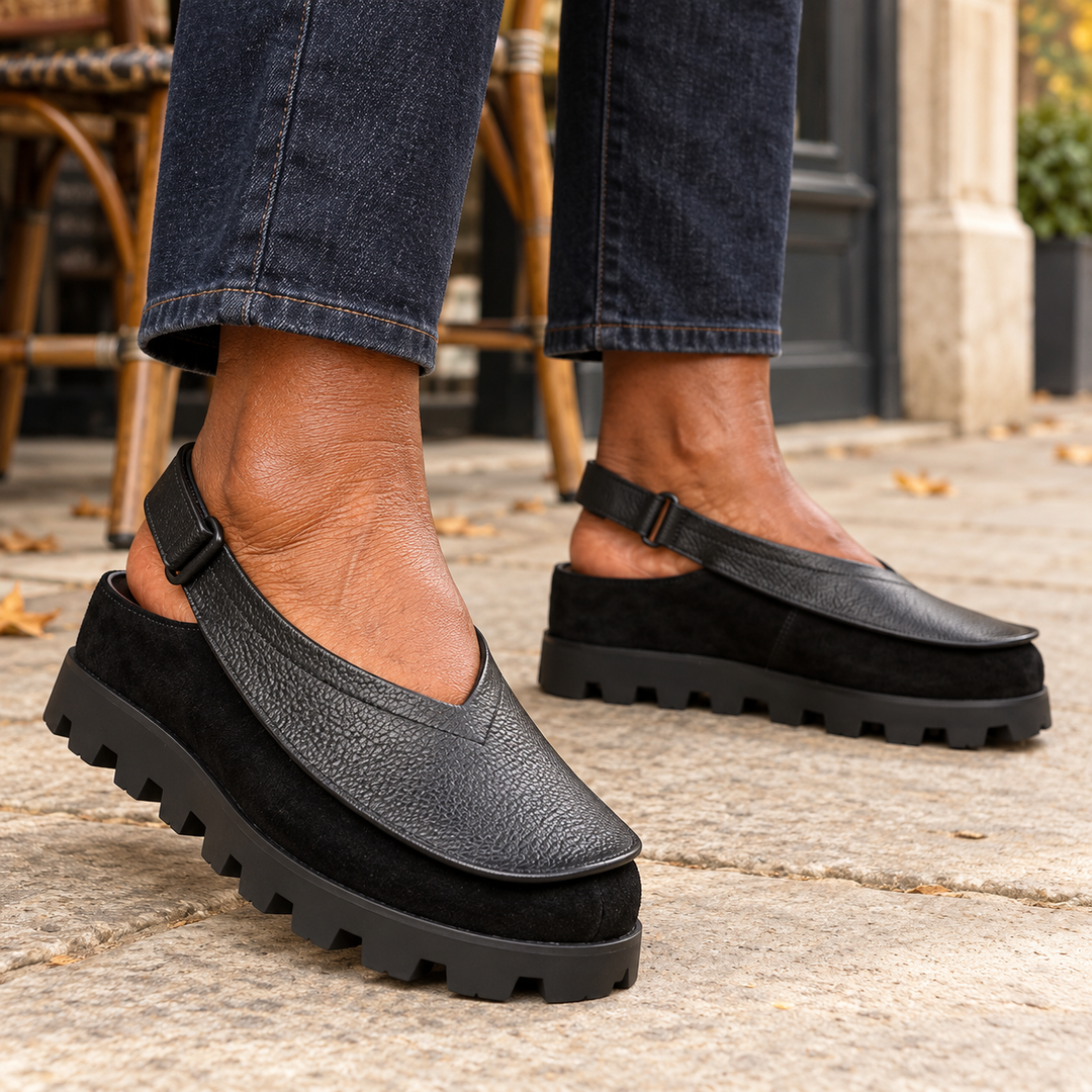 Janice Chunky Platform Slip-On Loafers in Black, worn in town