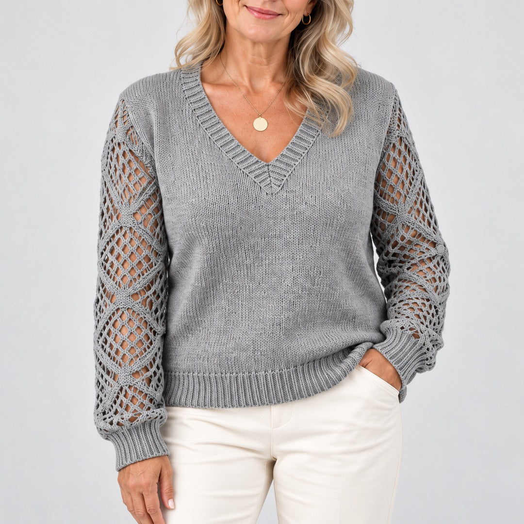 Close-up of the Jeanette Open-Knit Sleeve V-Neck Jumper in Grey