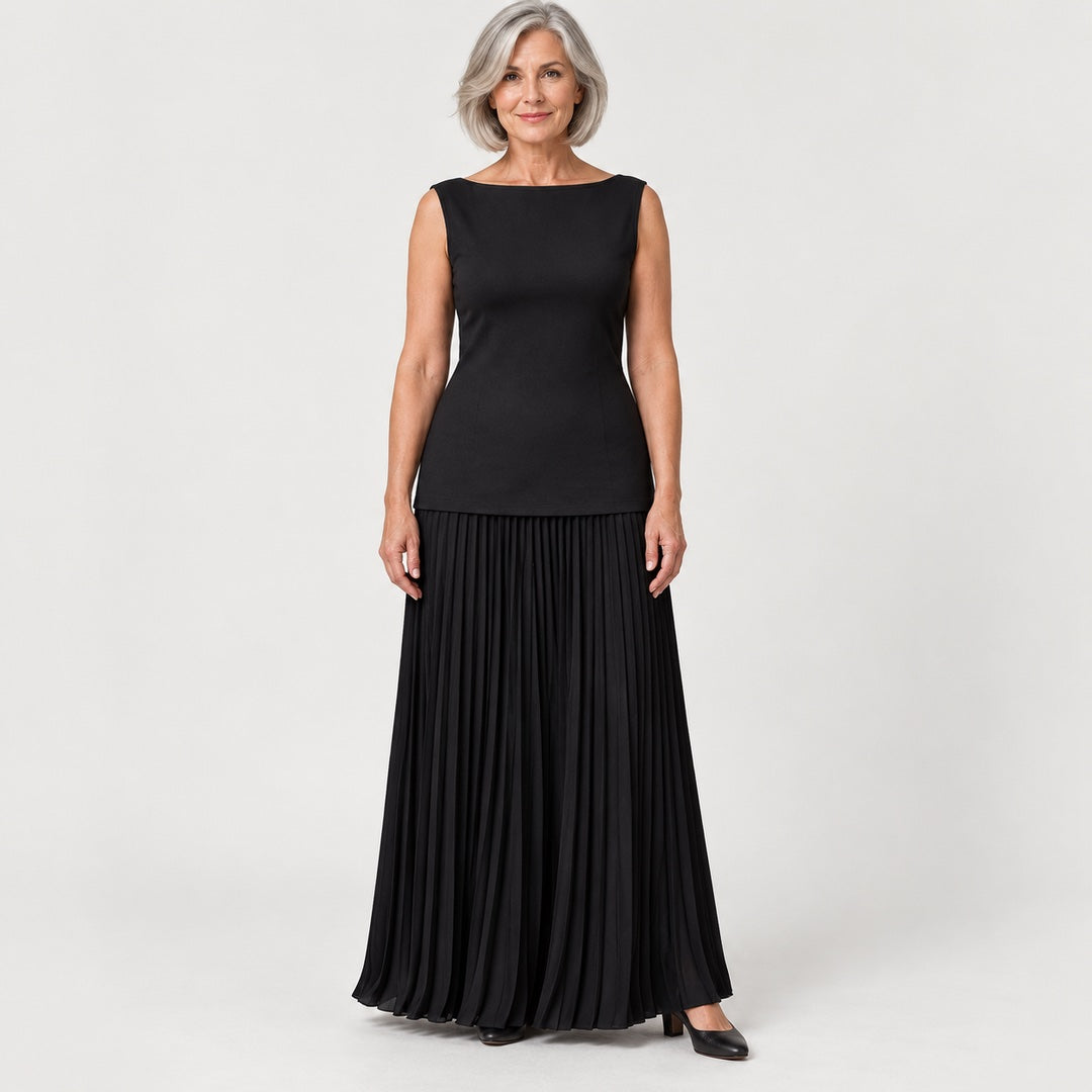 The Jenny Boat Neck Knit Top and Pleated Maxi Skirt Set in the studio
