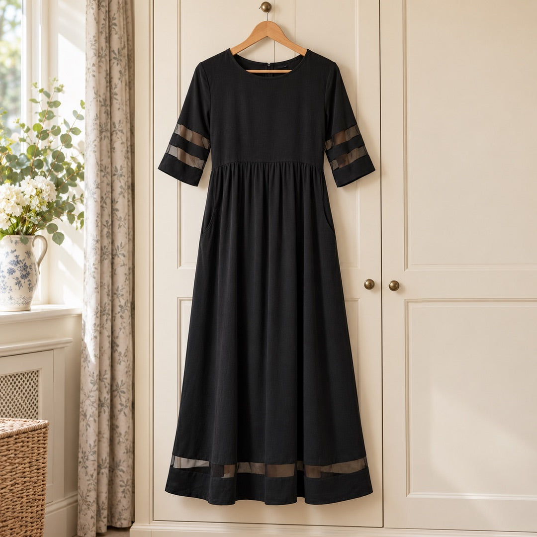 Jillian Sheer Stripe Panel Maxi Dress with Pockets in Black on a hanger