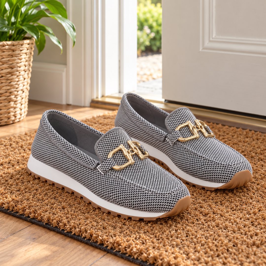 Judy Gold Buckle Knit Loafer Trainers on a doormat