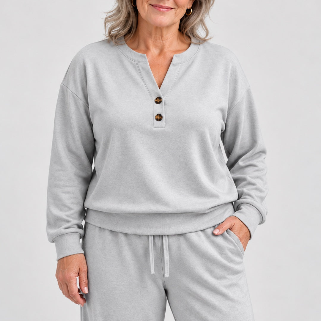 Close-up of the June Button Neck Jumper and Wide-Leg Trouser Set in Light Grey