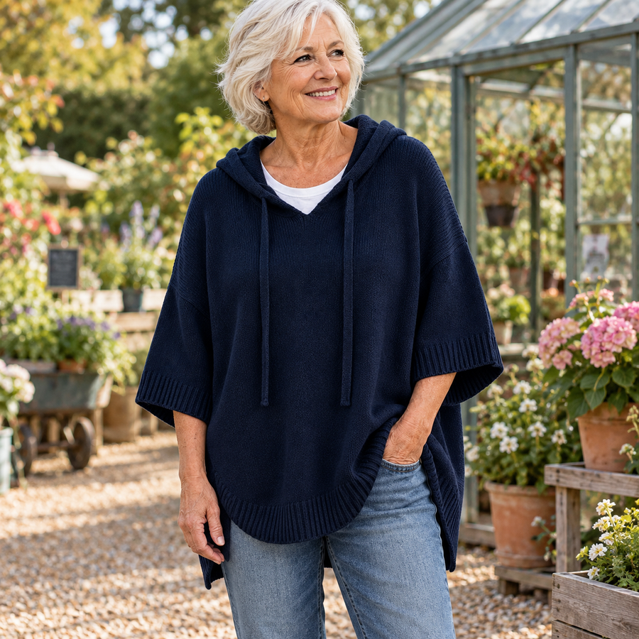 June Hooded Knit Poncho Jumper in Navy, worn out and about