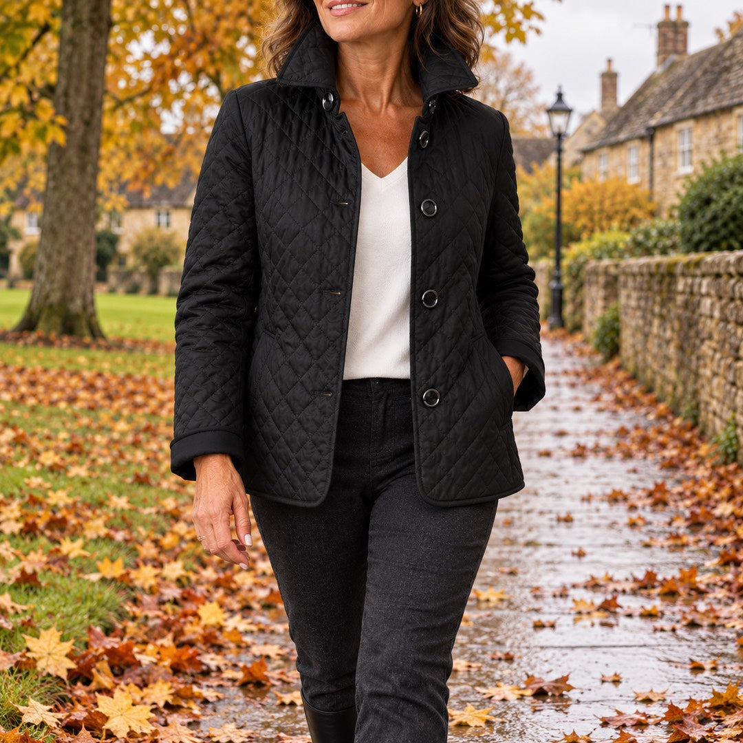 A woman wearing the Lesley Diamond Quilted Button Jacket in Black