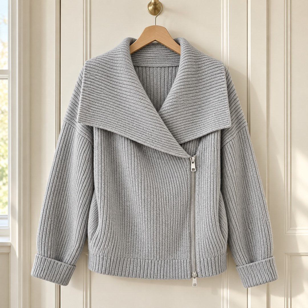 The Linda Wide Lapel Double-Zip Knit Cardigan in Grey on a hanger