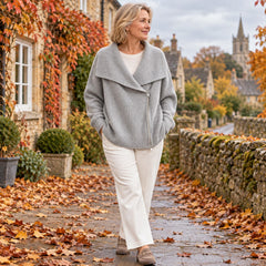 A woman wearing the Linda Wide Lapel Double-Zip Knit Cardigan in Grey