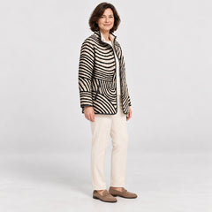 Side view of the Lisa Swirl Print Quilted Stand Collar Jacket in Black Cream Swirl