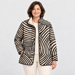 Close-up of the Lisa Swirl Print Quilted Stand Collar Jacket in Black Cream Swirl