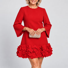 Close-up of the Marcia Flared Sleeve Dress with Flower Hem in Red