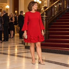 Marcia Flared Sleeve Dress with Flower Hem at the theatre