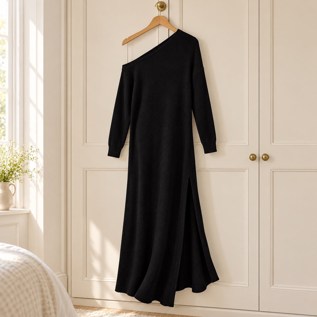 The Marilyn One-Shoulder Knit Maxi Dress with Side Split in Black on a hanger