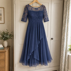 Mary Lace Bodice Chiffon Midi Dress in Navy on a hanger