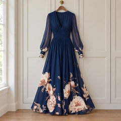 The Michelle Floral Hem Sheer Sleeve Maxi Dress in Navy on a hanger