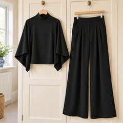 Miriam High Neck Cape Sleeve Wide-Leg Set in Black on a hanger
