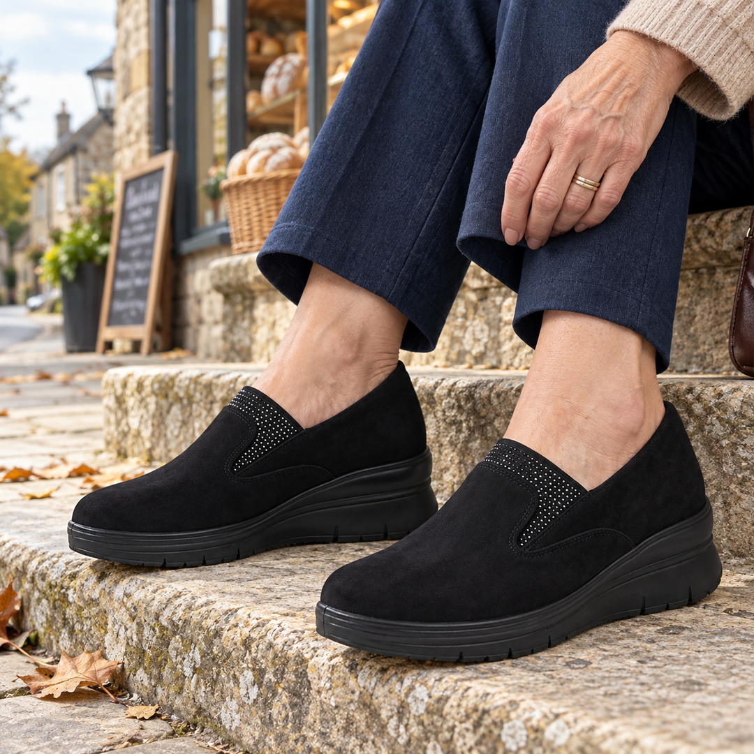 Moira Elastic Wedge Slip-On Shoes in Black, worn out and about