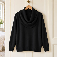 The Ruth Soft Cowl Neck Knit Jumper in Black on a hanger
