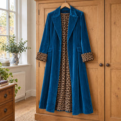 Theresa Long Velvet Coat with Leopard Lining in Petrol Blue on a hanger