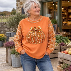 Tracey Sparkle Pumpkin Autumn Sweatshirt in Pumpkin Orange - worn at the farm shop