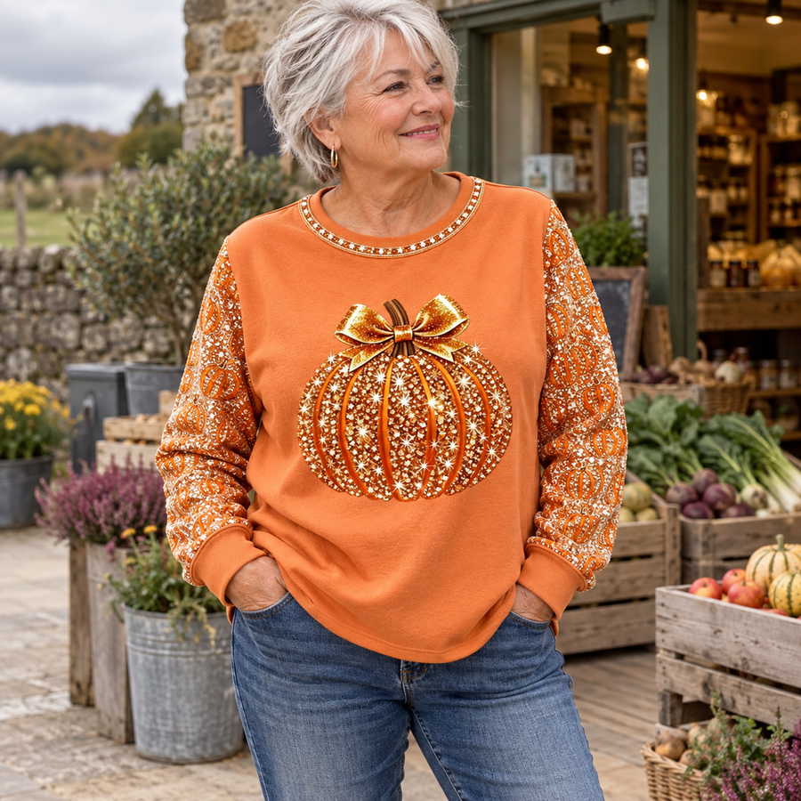 Tracey Sparkle Pumpkin Autumn Sweatshirt in Pumpkin Orange - worn at the farm shop